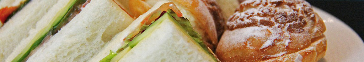 Eating Breakfast & Brunch Deli Sandwich at New York On Catron restaurant in Santa Fe, NM.